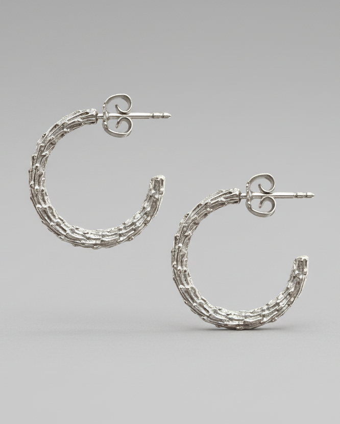 packshot of organic silver earring 