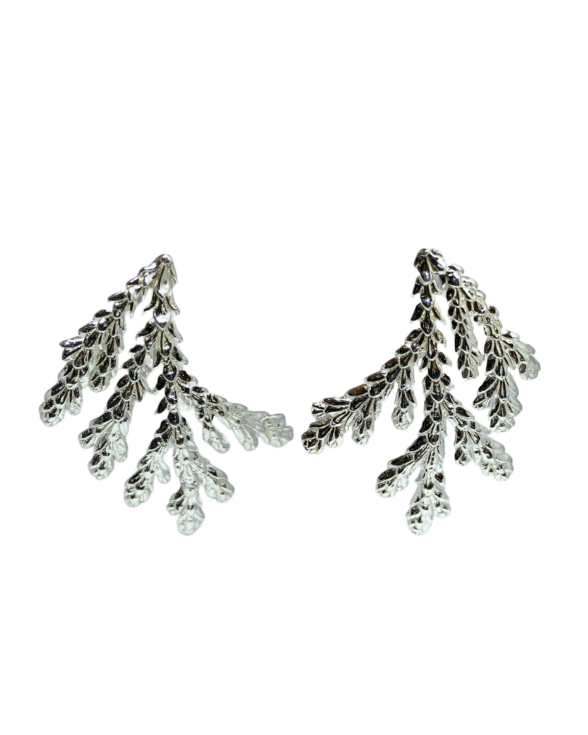 A pair of silver-toned drop earrings with a textured, leafy branch design, shown against a plain white background.